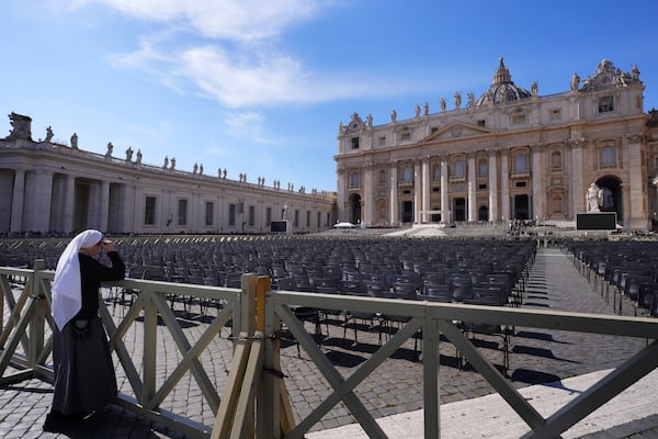 A nun prays at the Vatican at the time when Pope Francis would usually bestow his blessing, the Pontiff is currently recovering from a bilateral pneumonia at Rome's Agostino Gemelli Polyclinic, in Rome, Sunday, March 2, 2025. (AP Photo/Kirsty Wigglesworth)