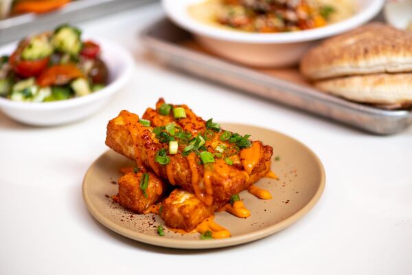 Halloumi side with tomato brown butter and scallions. Photo credit- Mia Yakel.