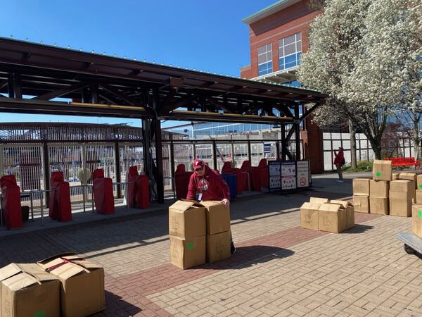 A Phillies stadium employee prepares for gates to open at Citizens Bank Park in Philadelphia on opening day, March 29, 2024. (AJC photo by Ken Sugiura)