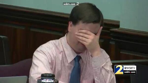 Justin Ross Harris reacts to hearing his brother Michael Baygents testify about a trip that their families took together, during Harris' murder trial at the Glynn County Courthouse in Brunswick, Ga., on Tuesday, Nov. 1, 2016. (screen capture via WSB-TV)