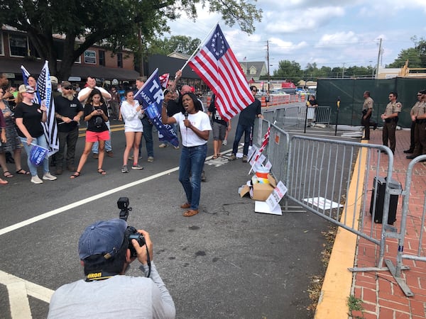 Atlanta Internet talk show host Lucretia Hughes brought her pro-Trump, pro-police message to a small but appreciative audience at the Dahlonega rally on Saturday, Sept. 14, 2019. (Photo: Chris Joyner/AJC)