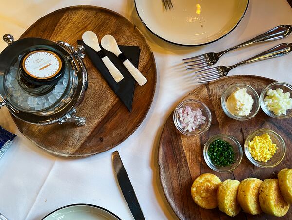 The caviar service at Pêche comes with the restaurant's house-made hailey cakes, in place of Russian blinis. Henri Hollis/henri.hollis@ajc.com