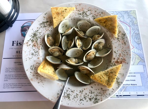 The Sapelo Island Clams starter at The Fish Dock Restaurant & Bar features locally harvested clams steamed with butter, garlic and white wine.  (Bill Dawers for The Atlanta Journal-Constitution)