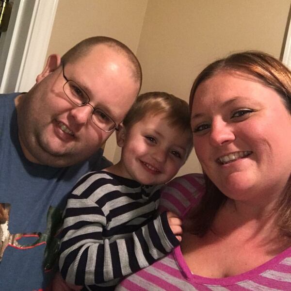 Kristen Hearne is shown with husband Matt and son Isaac.