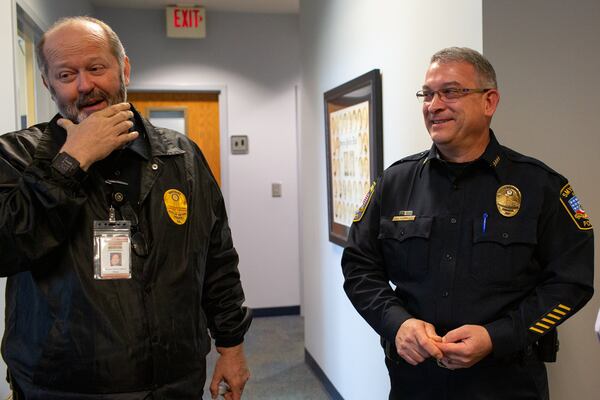 Chief of Police Joe Bennet speaks with Sgt. Chris Singleton at the Smyrna Police Headquarters in Smyrna, Georgia, on Wednesday, February 26, 2020. As Smyrna’s new Chief of Police, Joe Bennett wants to work on hiring new officers and address the increase in the number of traffic-related crashes and fatalities in the city. Bennett was sworn into the new position in February. (Photo/Rebecca Wright for the AJC)