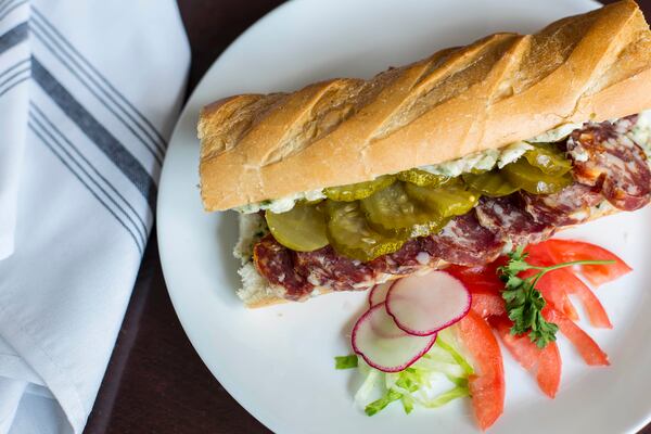 Salami & Butter Sandwich - Pine Street Market's Saucisson Sec French style salami seasoned with black pepper, garlic, and a splash of brandy, herbed butter and B&amp;B pickles. Photo credit: Tomas Espinoza.