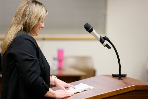 Bartow County resident Amanda Siniard reads her statement against the Planned Greenspace and Development District during the Bartow County Planning Commission meeting Monday at the Frank Moore Administration and Judicial Center. Miguel Martinez/AJC