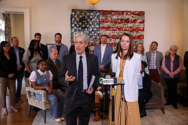 Attorneys Andy Rogers and Kara Phillips of Deitch & Rogers speak out against Gov. Kemp’s proposal to rein in civil damage claims, at a news conference on Monday, March, 3, 2025, in Atlanta. (Jason Getz / AJC)