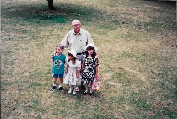 “Papa” King is seen with three of his grandchildren: (from left) Bill, Missy and Jennifer. (Courtesy of the King family)