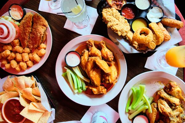 The food menu is filled with bar classics like wings, burgers, onion rings and nachos. 
Courtesy of Johnny’s Hideaway