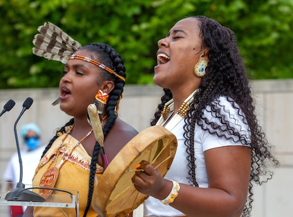 Yonasda Lonewolf (right) with the Indigenous Peoples Movement and Chenae Bullock sing for the crowd during the Rally & March for Reproductive Justice at Liberty Plaza near the state Capitol in Atlanta on Saturday, October 2, 2021. (Photo: Steve Schaefer for The Atlanta Journal-Constitution)