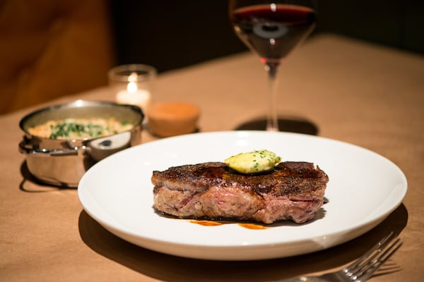 The 16-ounce Strauss grass-fed ribeye with side of creamed spinach. Photo credit- Mia Yakel.