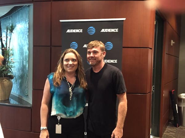 After his talk to AT&amp;T fans, he patiently took photos with many of them, including AT&amp;T exec Suzanne Navarro. CREDIT: Rodney Ho/rho@ajc.com