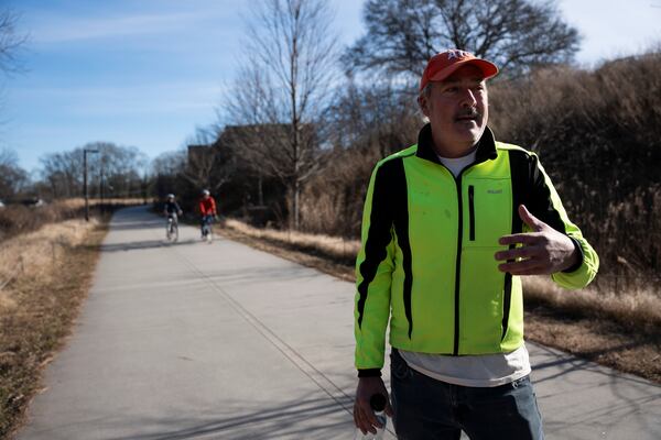 Matt Garbett, co-founder of a progressive urban advocacy group called ThreadATL, stands on the Westside Trail along the Beltline on Tuesday, Jan. 14, 2025. (Olivia Bowdoin for the AJC) 