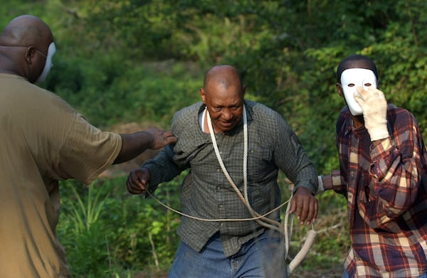 Activists seeking to remember the victims of the Moore’s Ford lynching and focus public attention on the 1946 murders have been staging annual reenactments like this one in 2005.