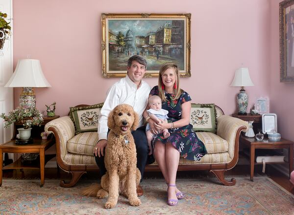 The Raymond family includes Carson (left) Coleman, baby Chapman and their dog, Fontaine. Courtesy of Linda Nichols Photography 