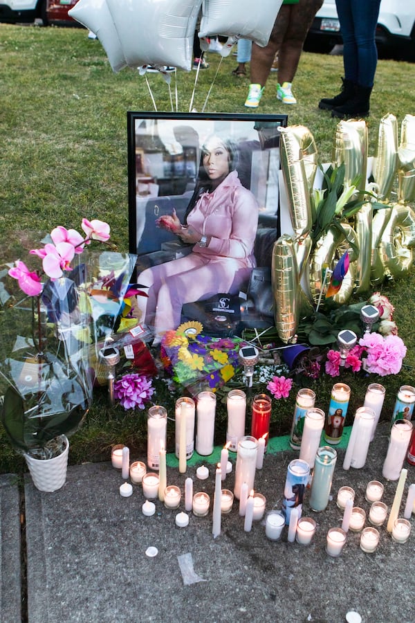 A memorial sits during the candlelight vigil for Koko Da Doll on Saturday, April 22, 2023, in Atlanta. Koko was a Black trans woman who was murdered this week and was the star of "Kokomo City," an upcoming documentary that highlights the experiences of trans sex workers that premiered at the Sundance Film Festival earlier this year. CHRISTINA MATACOTTA FOR THE ATLANTA JOURNAL-CONSTITUTION.