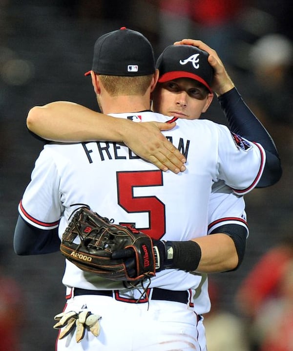 After seven consecutive losses, the Braves finally had something to celebrate Tuesday. Freddie Freeman hugged Chris Johnson, who had the game-winning RBI.