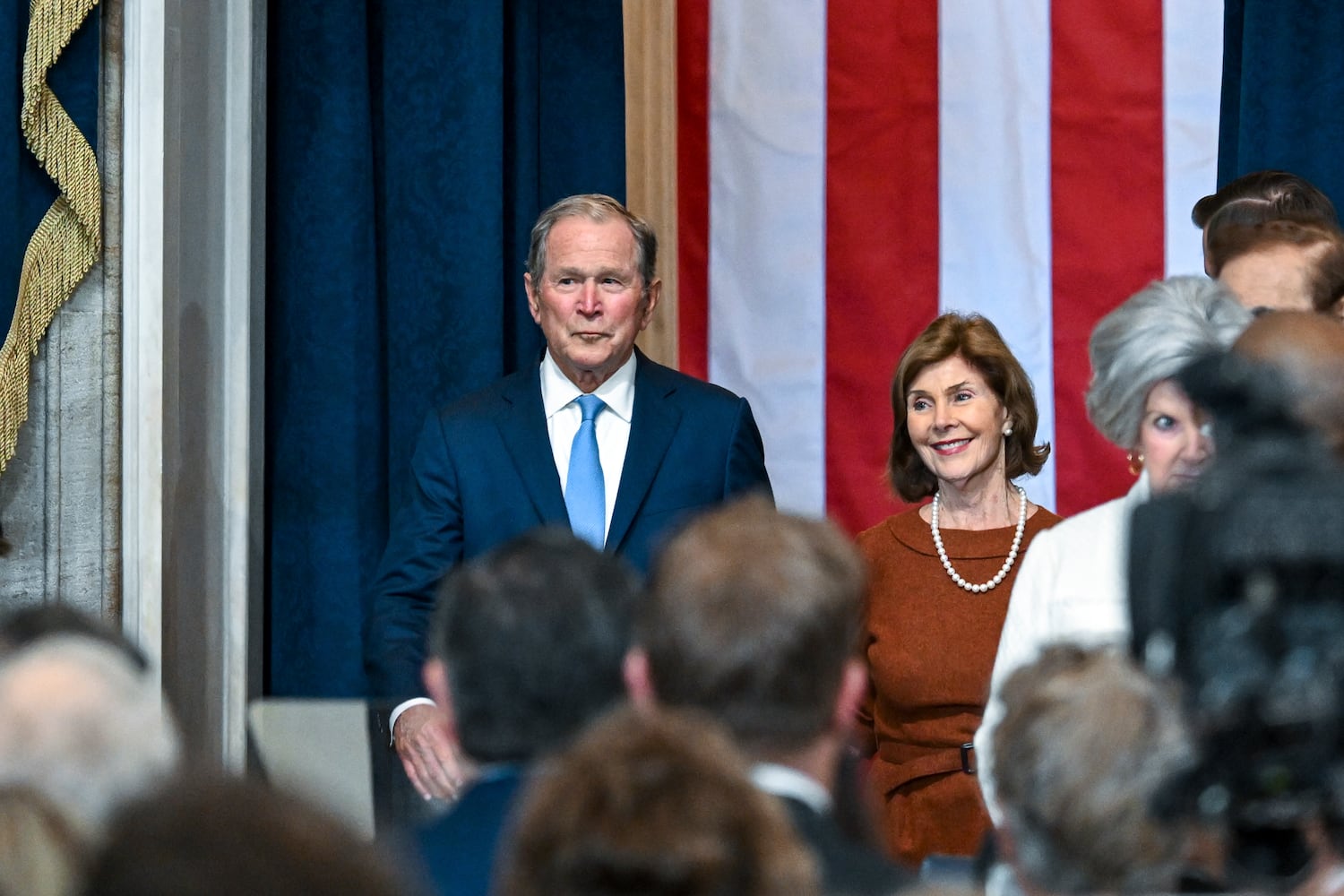 Former President George W. Bush and former first lady Laura Bush arrive before the inauguration of Donald Trump as the 47th president in the Rotunda at the Capitol in Washington on Monday morning, Jan. 20, 2025. (Kenny Holston/The New York Times)