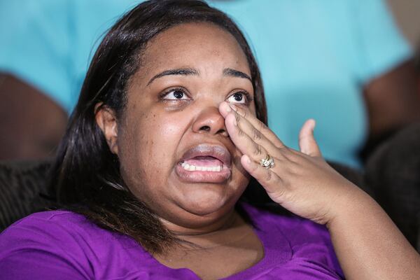 Tia Coleman talks about how her life has changed since losing her husband and three children in the duck boat tragedy in Branson, Mo., during a press conference held at her home in Indianapolis, Tuesday, Aug. 14, 2018. "I never want another family ever to have to go through this," Coleman said. Coleman and her family members began a petition on Change.org to encourage support for a Senate bill that would require duck boats to either be reengineered for safety or banned altogether.