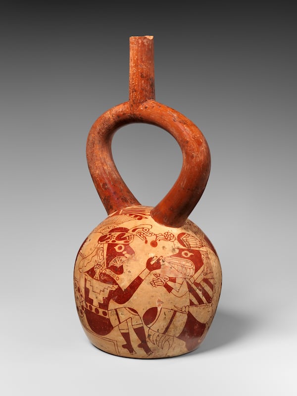 Stirrup-Spout Vessel with Wrinkle Face and Iguana. Moche, made in northern Peru, 500-800 CE. Terra cotta. Collection of the Metropolitan Museum of Art, New York. (Courtesy of the Michael C. Carlos Museum)