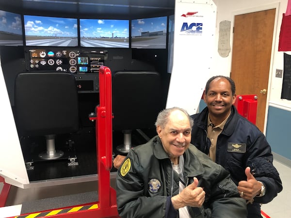 Julius Alexander started ACE in a trailer in 1980 at Fulton County Airport, aka Charlie Brown Field offering Saturday classes for a dozen students for $12 per month. He is with his son Patrick who now runs the nonprofit. 