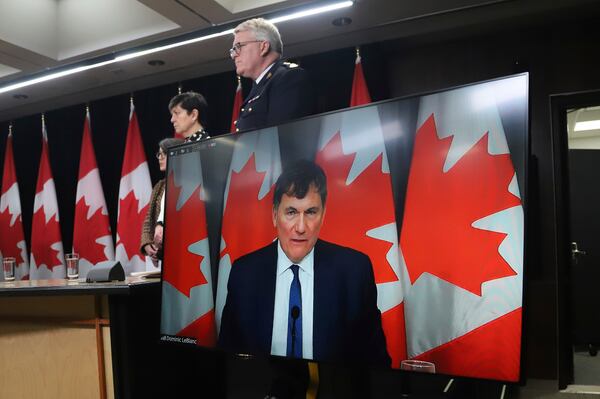 Minister of Public Safety, Democratic Institutions and Intergovernmental Affairs Dominic LeBlanc speaks virtually at a press conference on new measures to strengthen gun control in Ottawa, Ontario, on Thursday, Dec. 5, 2024. (Patrick Doyle/The Canadian Press via AP)