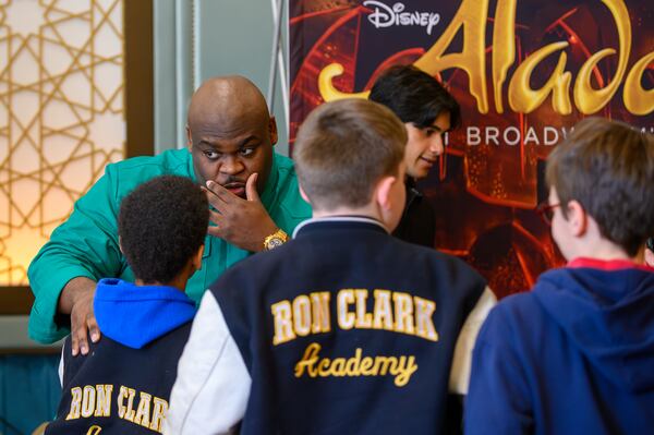 Marcus M. Martin (Genie) answers a question from a Ron Clark Atlanta student during a panel discussion with the cast of Disney on Broadway’s “Aladdin” at the Fox Theatre in Atlanta, GA on Thursday, January 11, 2024. (Jamie Spaar for the Atlanta Journal Constitution)