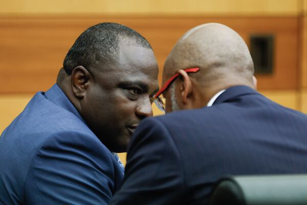 Oliver Simmonds (left) confers with his attorney, Jackie Patterson, during the first day of jury selection.