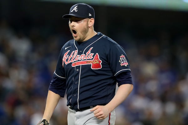 Braves relief pitcher Tyler Matzek reacts to striking out Los Angeles Dodgers outfielder Mookie Betts for the final out in the eighth inning of Game 4 of the NLCS Wednesday Oct. 20, 2021, in Los Angeles. (Curtis Compton / curtis.compton@ajc.com)