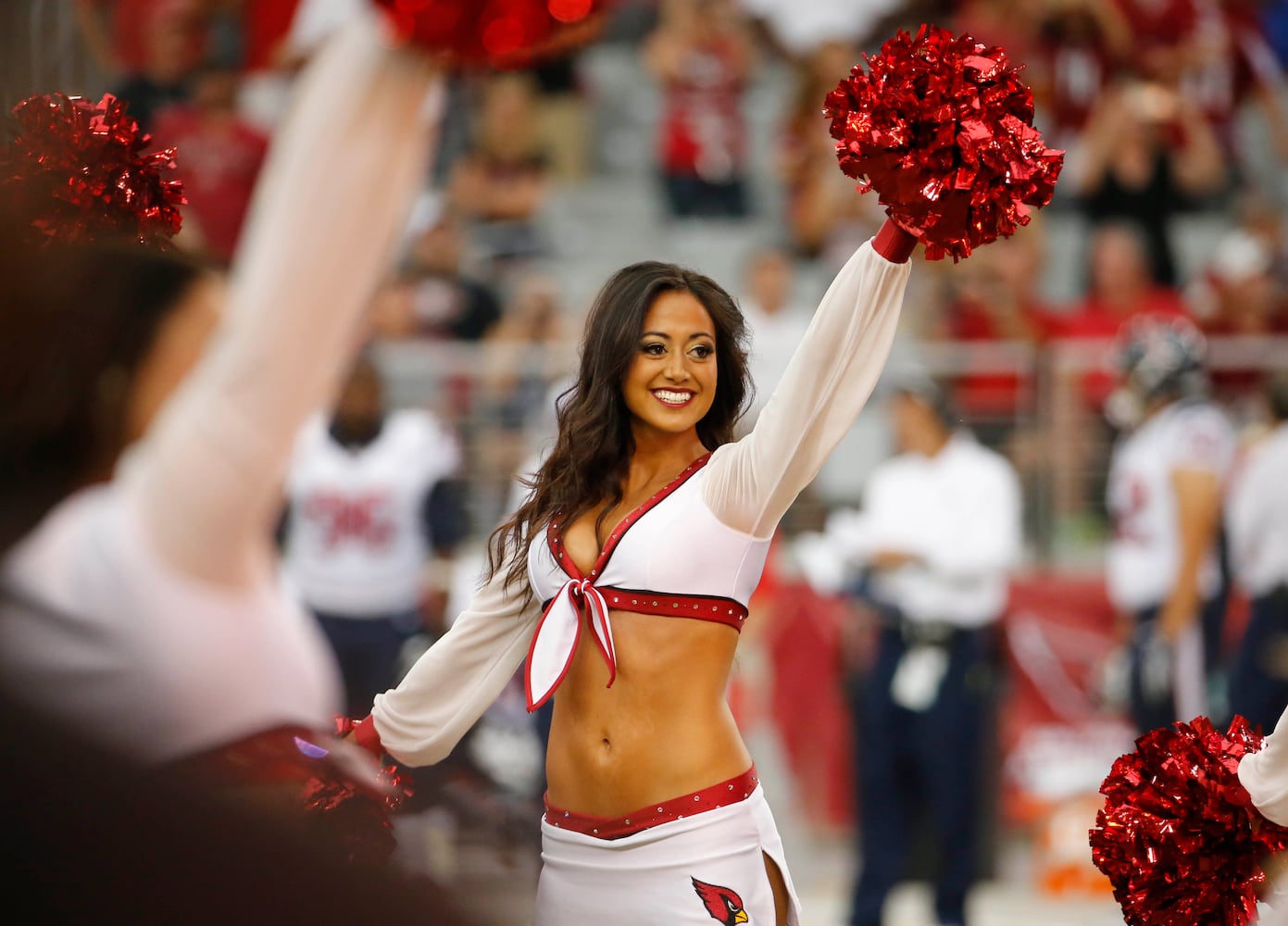 NFL cheerleaders perform at preseason games