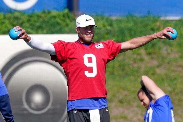 Los Angeles Rams quarterback Matthew Stafford warms up during practice for an NFL Super Bowl football game Wednesday, Feb. 9, 2022, in Thousand Oaks, Calif. The Rams are scheduled to play the Cincinnati Bengals in the Super Bowl on Sunday. (AP Photo/Mark J. Terrill)