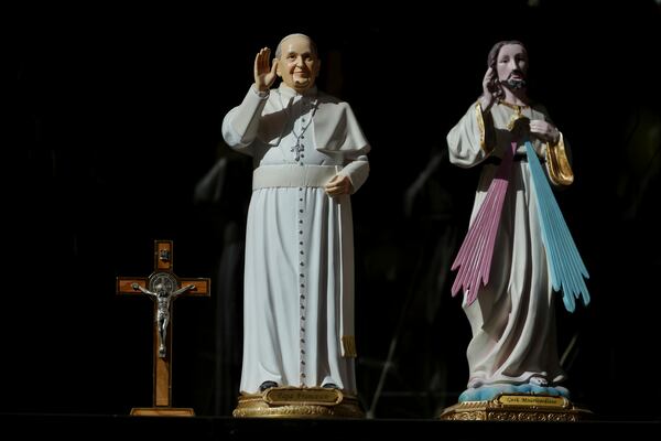 A figurine of Pope Francis is displayed in a shop window in Rome, Thursday, Feb. 27, 2025. (AP Photo/Kirsty Wigglesworth)