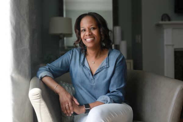 Wendy Stewart poses for a photo in her home on Monday, May 6, 2019, in Atlanta. When Stewart was diagnosed with ductal carcinoma in situ, she was urged to immediately undergo a mastectomy, but instead she waited and watched to see what it would do.  