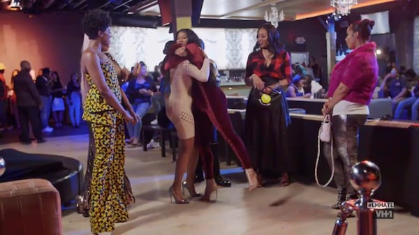  Tommie's semi-sincere hug of reconciliation with Karlie where it seems like Tommie is trying to squeeze the life out of Karlie.