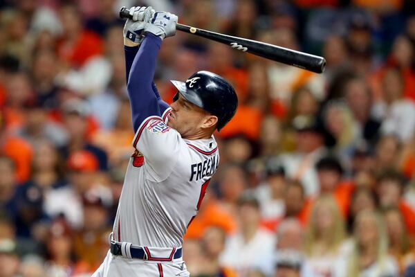 Braves first baseman Freddie Freeman hits an RBI double during the fifth inning against the Houston Astros in game 6 of the World Series at Minute Maid Park, Tuesday, November 2, 2021, in Houston, Tx. Curtis Compton / curtis.compton@ajc.com