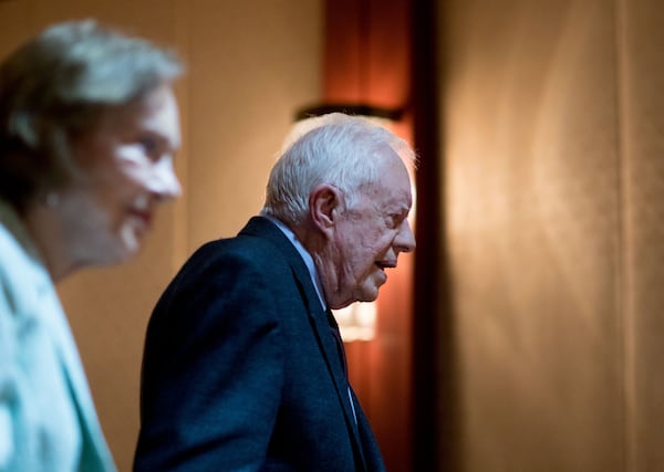 President Jimmy Carter and Rosalynn Carter walk together following a town hall at The Carter Center, Tuesday, Sept. 17, 2019, in Atlanta. BRANDEN CAMP/SPECIAL