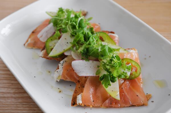 Bourbon Cured Salmon with benne seed crackers, apple and jalapeno cream. (BECKY STEIN PHOTOGRAPHY)