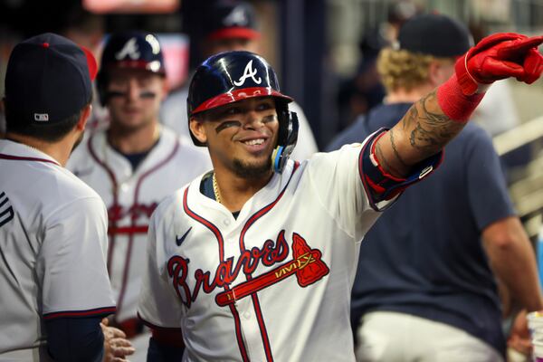 Atlanta Braves shortstop Orlando Arcia celebrates with teammates in the dugout after hitting a two-run home run during the fourth inning against the Philadelphia Phillies at Truist Park, Wednesday, August 21, 2024, in Atlanta. (Jason Getz / AJC)
