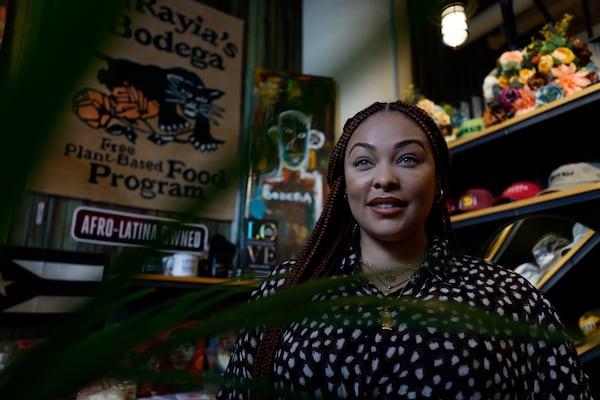 Artist, producer, and entrepreneur, LaRayia Gaston, the owner of LaRayia's Bodega located within Ponce City Market, poses  at her establishment, a convenient market focused on tackling problems related to food availability and equality." Thanks to its Cuban and Puerto Rican heritage, the Bodega offers a colorful spectrum of colorful and original items.
Miguel Martinez /miguel.martinezjimenez@ajc.com