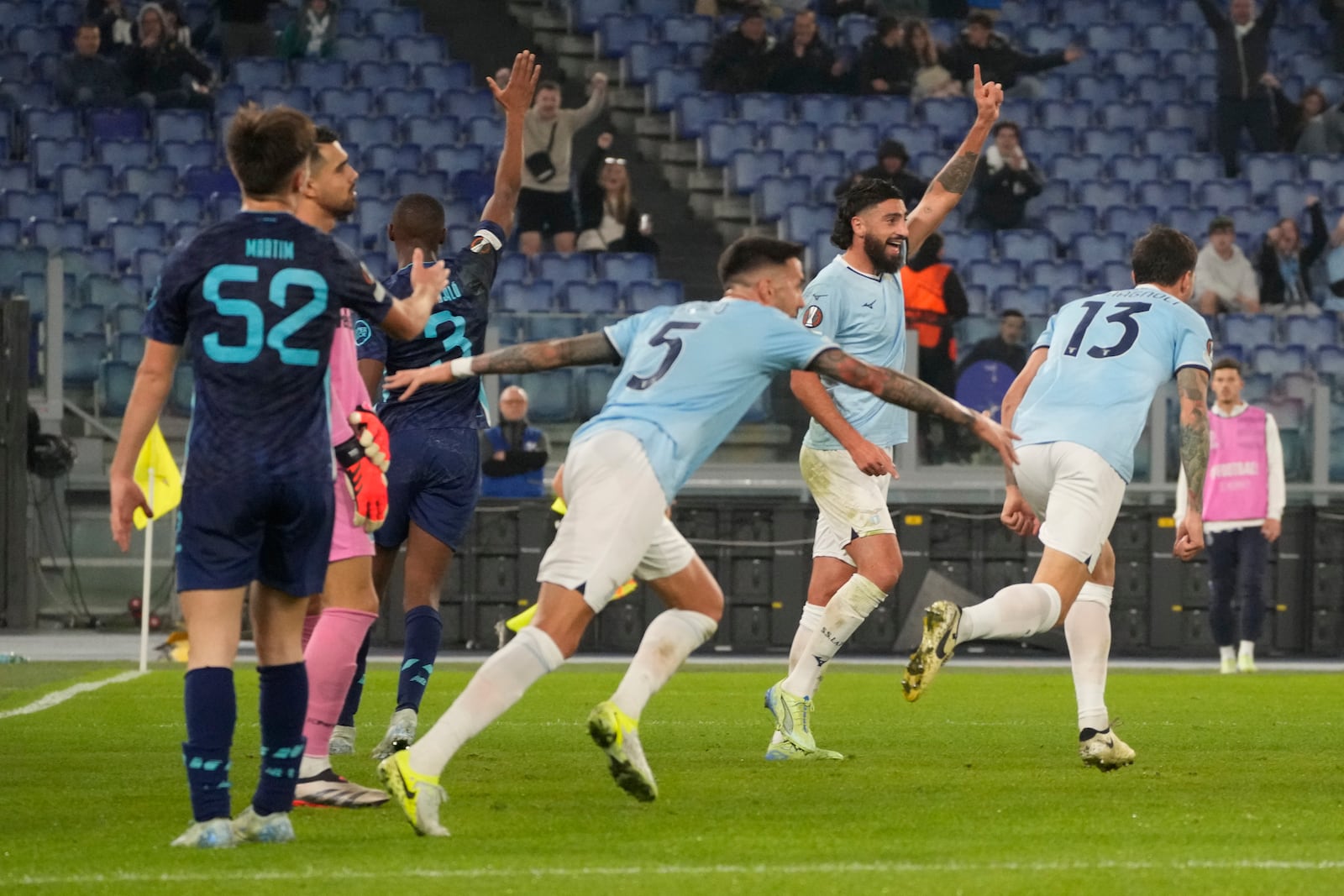 Lazio players celebrate after a goal during the Europa League soccer match between Lazio and Porto at Rome's Olympic Stadium on Thursday, Nov. 7, 2024. (AP Photo/Gregorio Borgia)