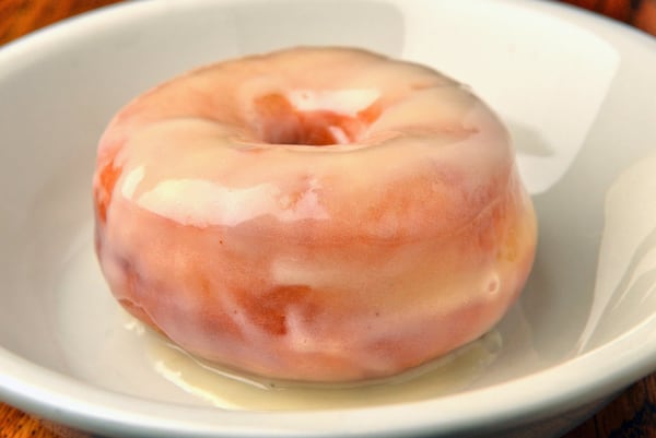 Fried Yeast Doughnuts with Cream Cheese Glaze. (Styling by Chrysta Poulos / Chris Hunt for The Atlanta Journal-Constitution)