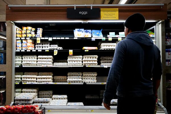 A customer browses for eggs at Safeway, Monday, Jan. 27, 2025, in Seattle. (AP Photo/Lindsey Wasson)