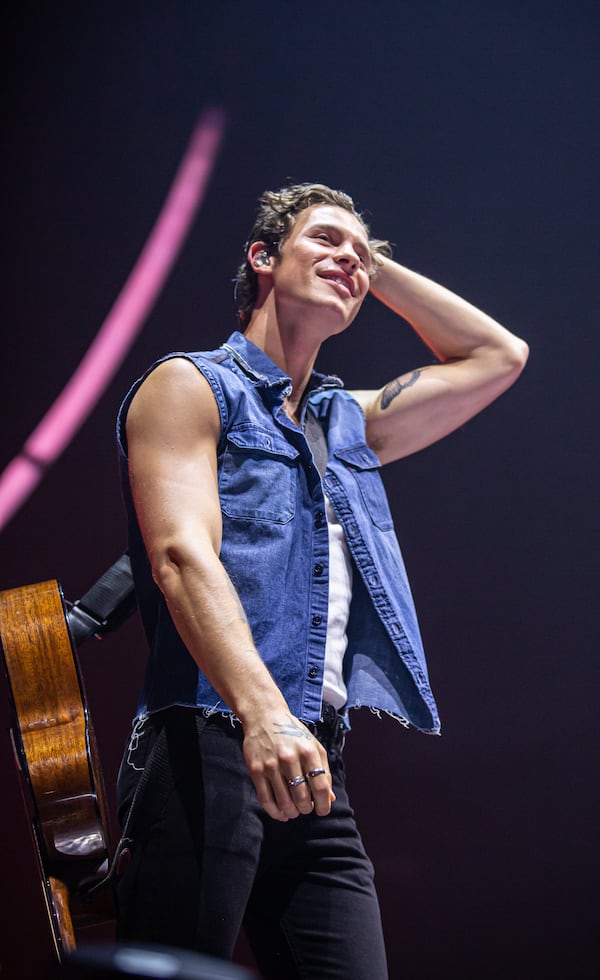 Shawn Mendes surveys the sold-out State Farm Arena crowd on July 31, 2019.