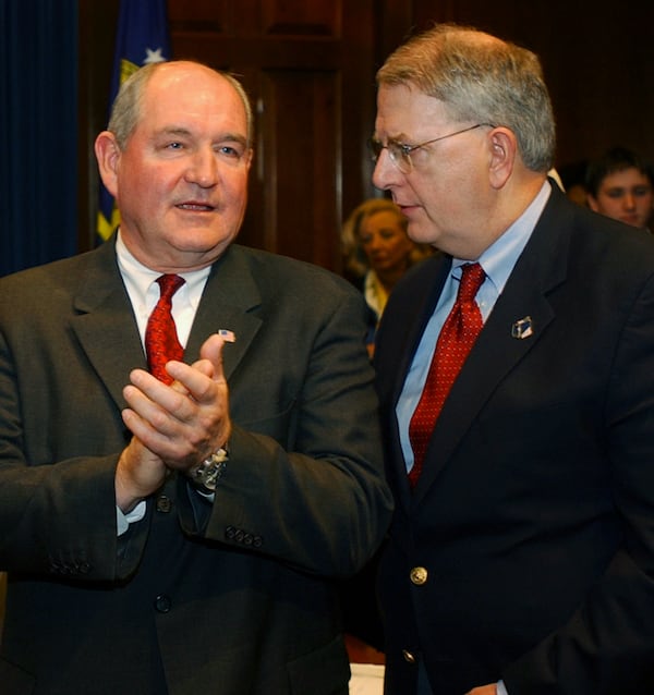 Future Gov. Sonny Perdue and then-Gov. Roy Barnes in 2002 (AP File)