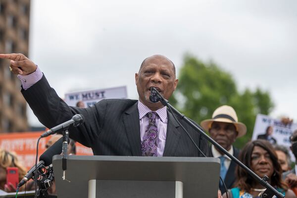 Bishop Reginald Jackson of the African Methodist Episcopal Church was one of a group of 40 religious leaders who rallied Tuesday at Liberty Plaza, near the Georgia Capitol. The religious leaders, who represented more than 1,000 congregations, opposed Georgia's new election law, Senate Bill 202, and called on Congress to take action to protect voting rights. (Alyssa Pointer / Alyssa.Pointer@ajc.com)