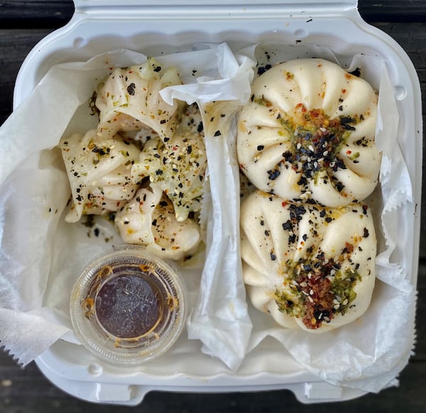 Mushi Ni serves dim sum dishes, such as shrimp hakao (left) and char sui pork buns. Wendell Brock for The Atlanta Journal-Constitution