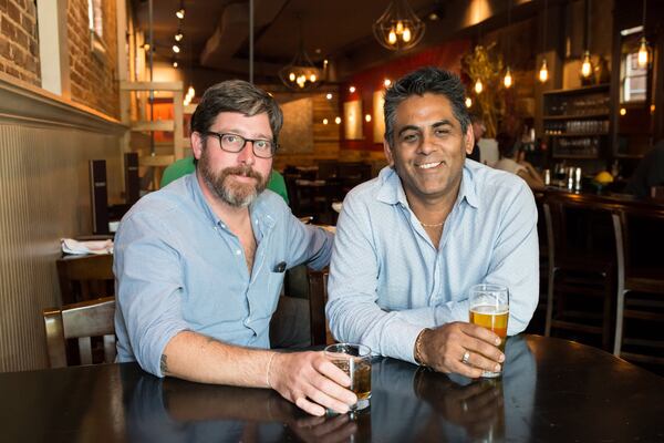 Two of the owners, Brian Buchanan and Paul Vinces (from left to right), at Truman in Decatur. Photo Credit: Mia Yakel.