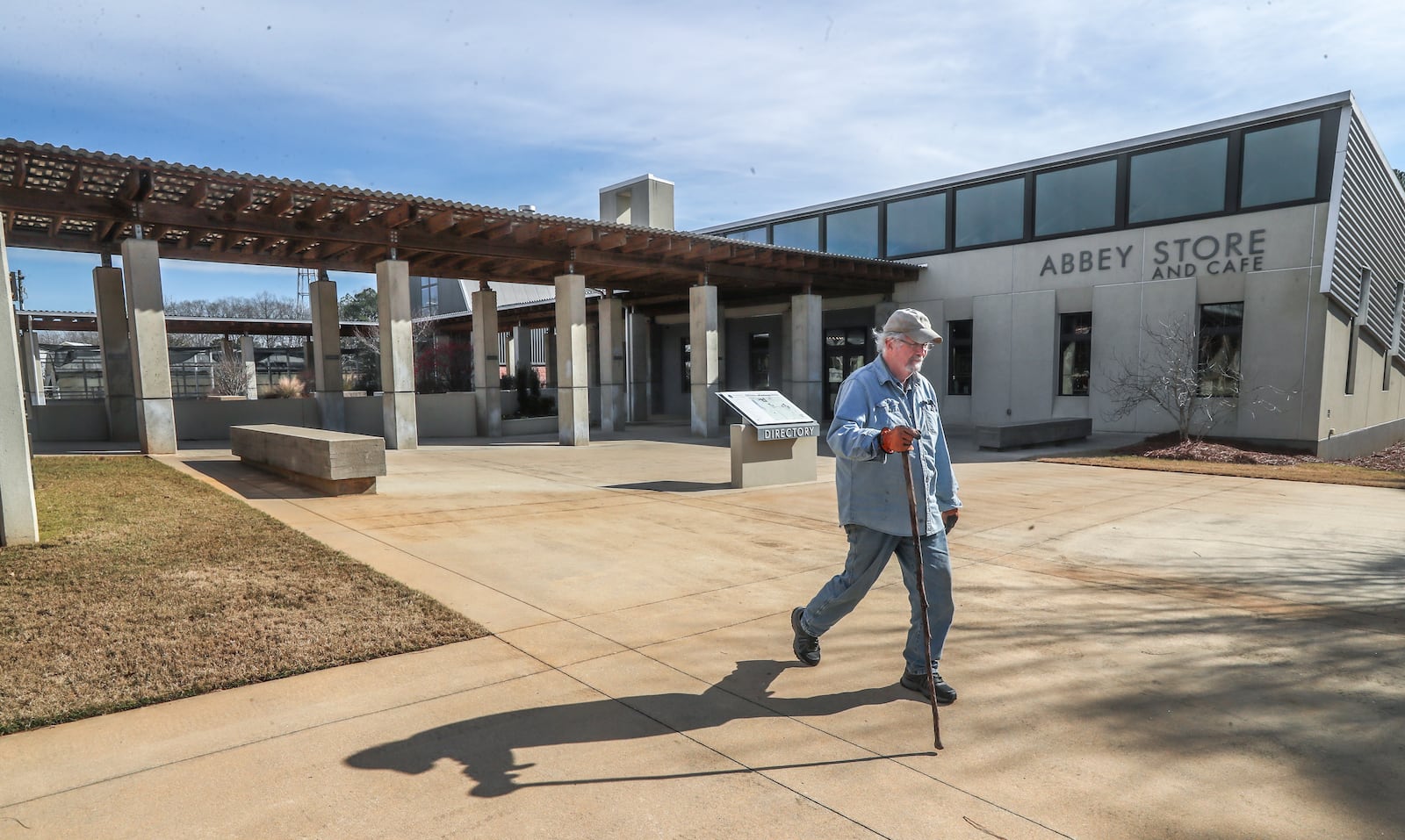 Robert Farrar frequently walks the Monastery grounds seen here near the Abbey Store on Thursday, Jan 13, 2022. (John Spink / John.Spink@ajc.com)

