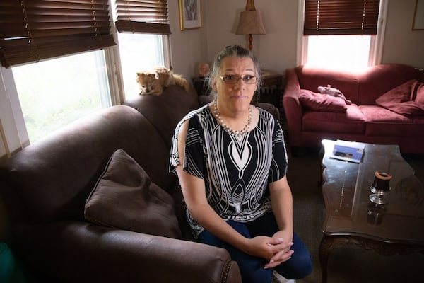 Former Byron, Ga., fire chief Rachel Mosby poses for a photograph in her Decatur home on June 29, 2020. Mosby, who is transgender, filed a discimination suit against her former employer earlier this year. STEVE SCHAEFER FOR THE ATLANTA JOURNAL-CONSTITUTION